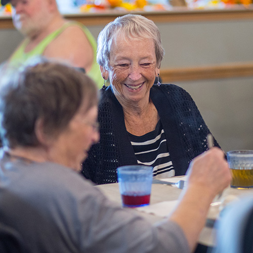Sunset Ridge Memory Care Residents Enjoying a Meal