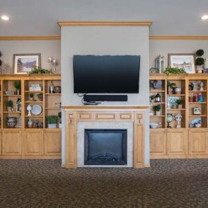 Sunset Ridge Memory Care - Main Common Area Television and Fireplace