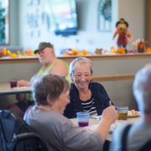 Sunset Ridge Memory Care - Residents Enjoying a Meal